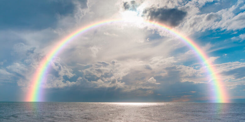 Amazing tornado over the sea with rainbow 虹と海